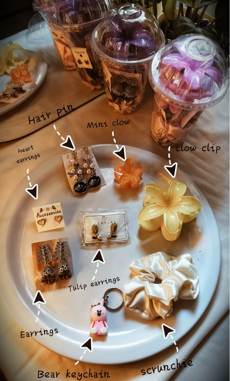 Labelled accessories: hair pins, claw clips, heart and tulip earrings, keychain