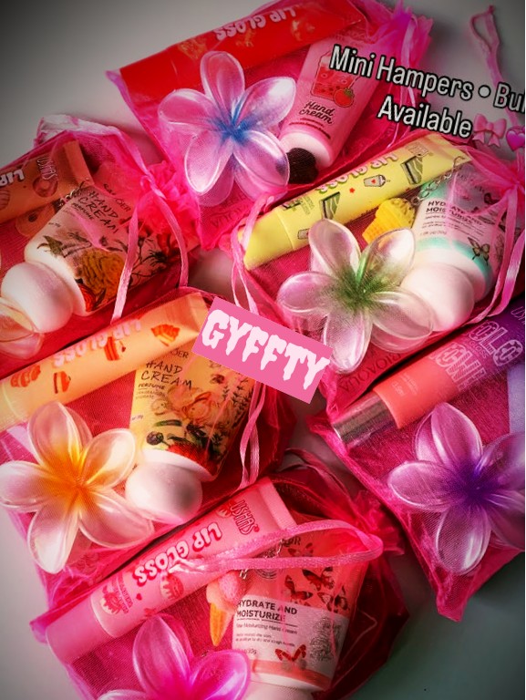 Pink organza mini hampers with hand cream and lip gloss
